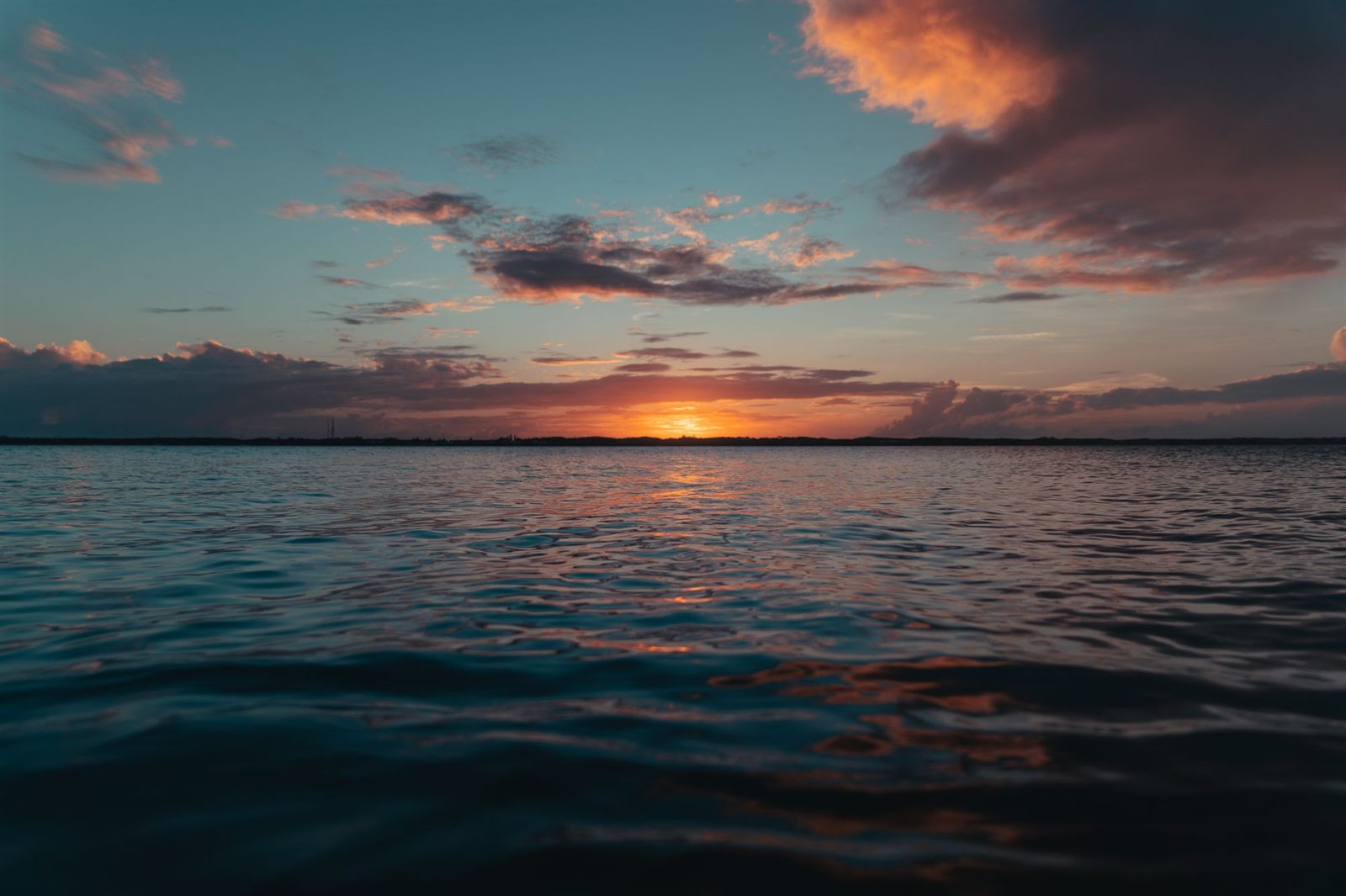 Sunset over calm water in Central Eleuthera, Bahamas
