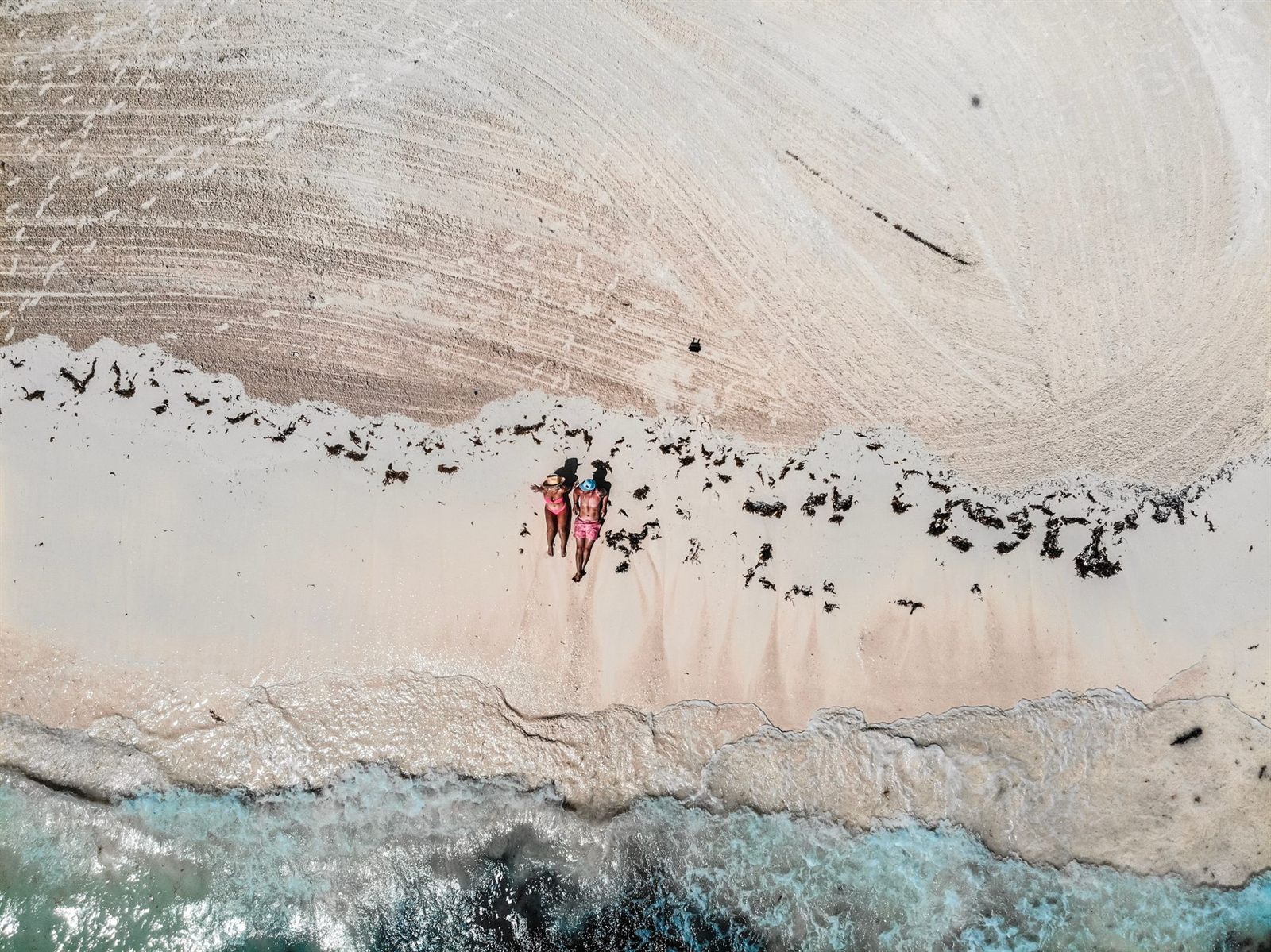 Aerial view of a white-sand beach in Exuma, Bahamas